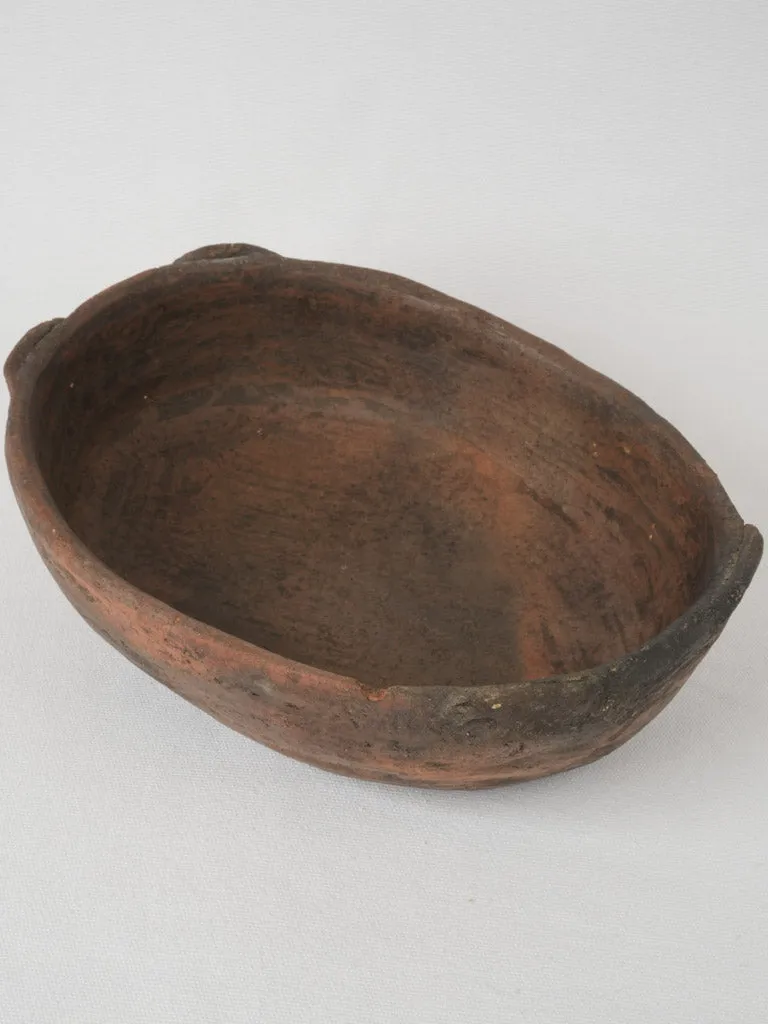 19th-century terracotta folk art oval bowl 13"