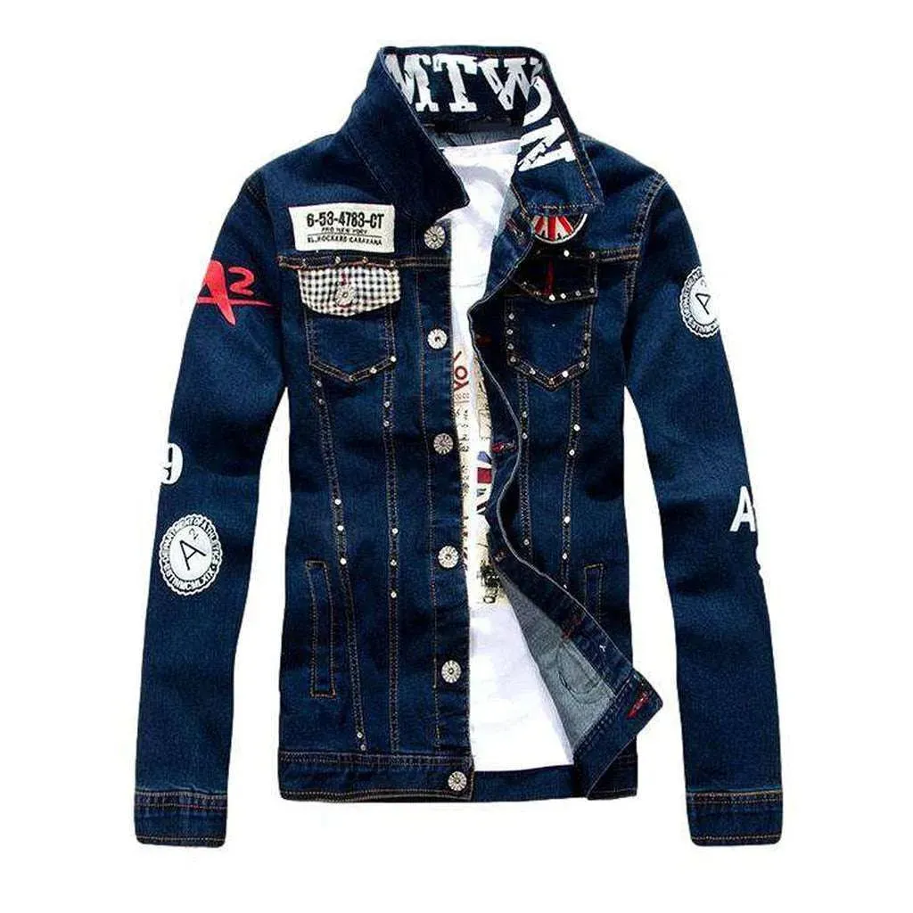 Rivet embellished embroidered denim jacket